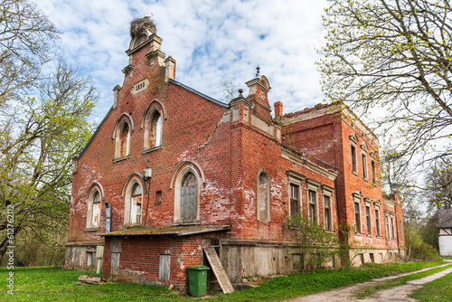 Abandoned red brick Regi manor, Latvia. © Bargais