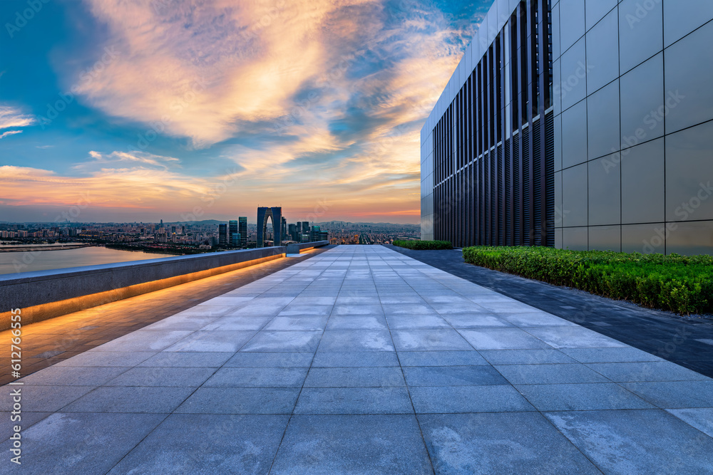 Pedestrian passage and city skyline with modern building at sunset in Suzhou, Jiangsu Province, China. high angle view.