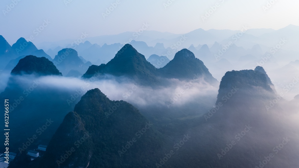 Aerial view of karst mountain and cloud natural landscape in the early morning, Guilin, Guangxi, China.