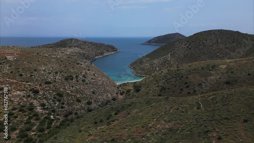 Aerial view of a tropical blue bay at the southern end of Cape Tenaro in the Mani of Peloponnese coastline in Greece