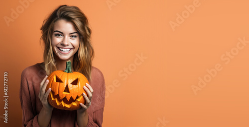 Happy Young Woman Holding a...