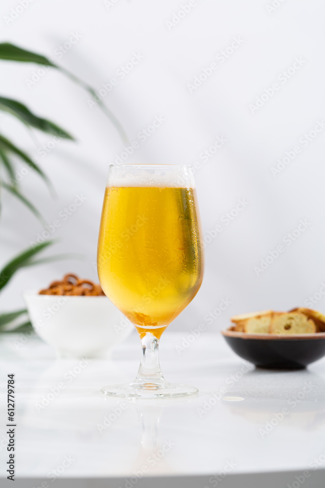 One glass with cold beer with drops One glass with cold beer with drops