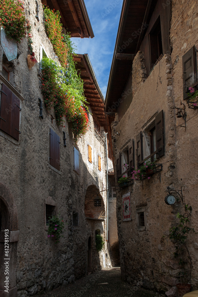 Via Ettore Fieramosca in the medieval village of Canale di Tenno, Trentino-Alto Adige, Italy.  Tenno is  included in the list of the most beautiful villages in Italy