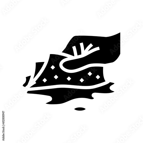 soaking spills with paper towel glyph icon vector. soaking spills with paper towel sign. isolated symbol illustration