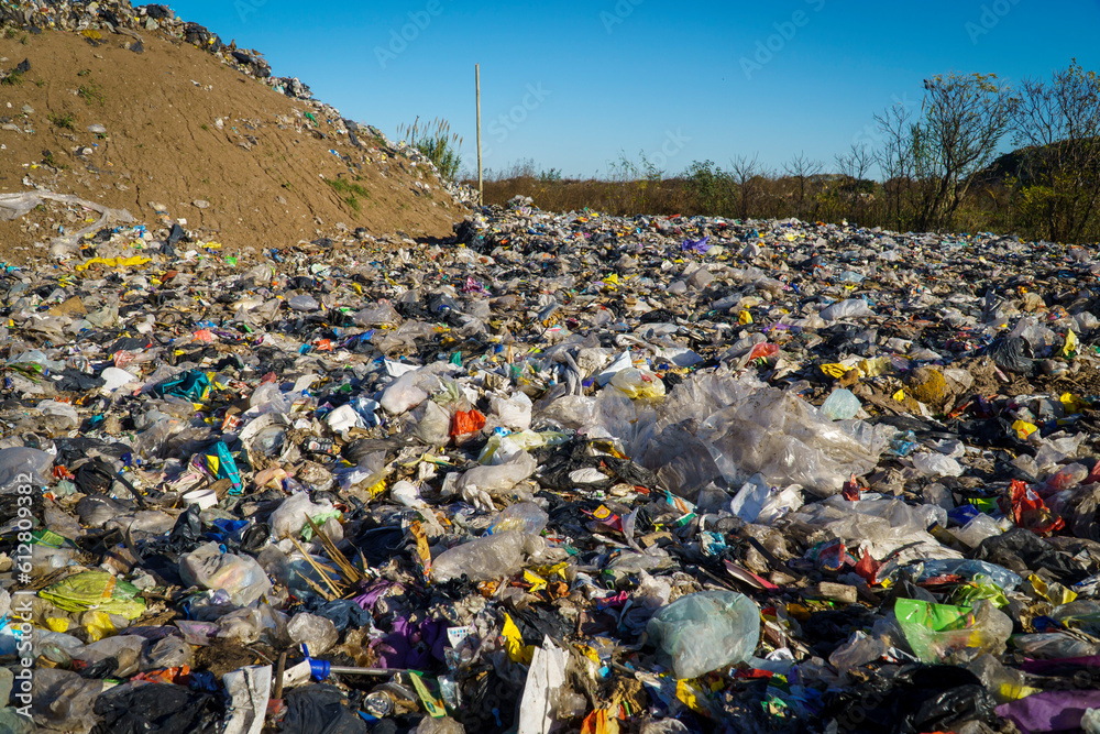 Obraz premium Non-recyclable waste on a dumping ground