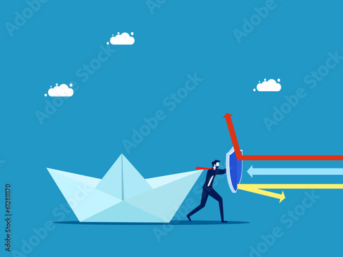 Business protection. Businessman holding shield to protect paper boat from arrow attack vector