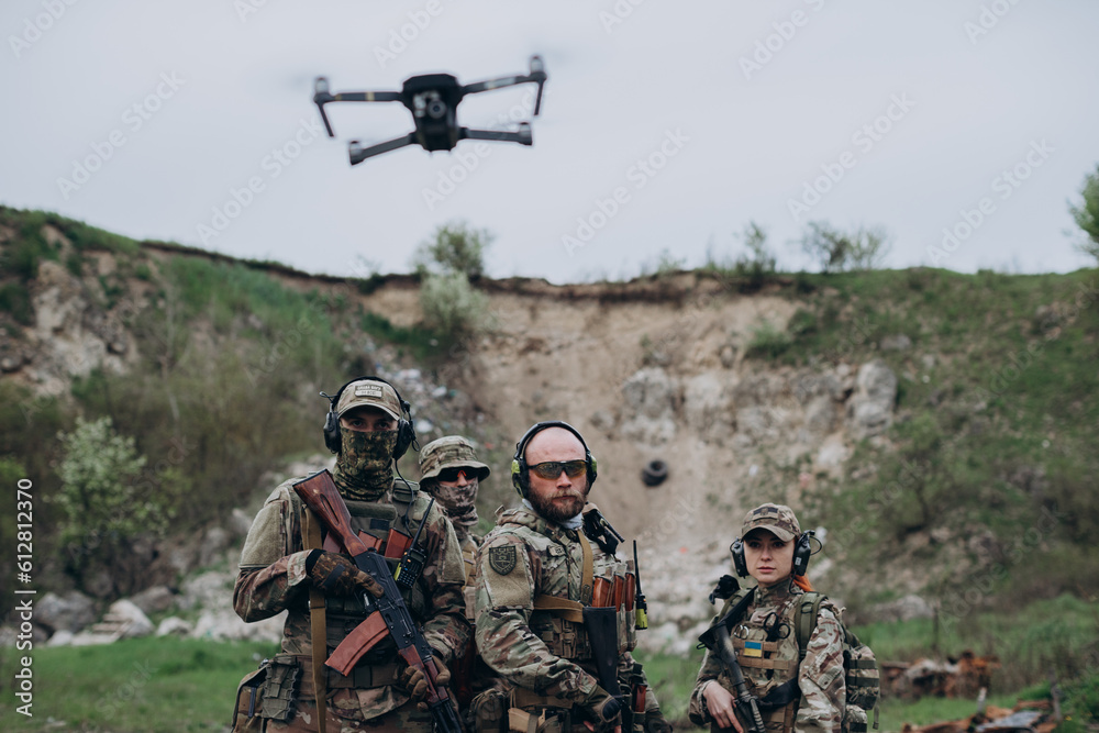 Armed Ukrainian militarymen using a drone Armed Ukrainian militarymen using a drone