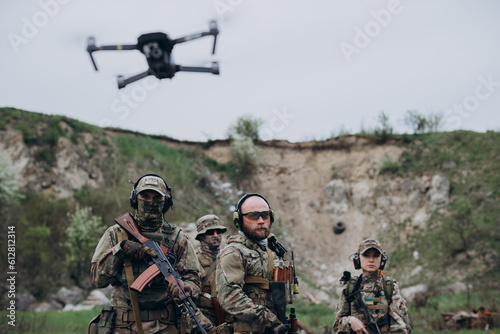 Company of Ukrainian militarymen with a drone photo