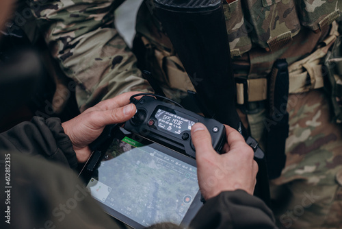 Ukrainian drone operator working with a tablet