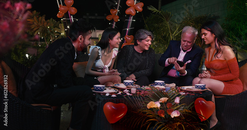 Canvas Print Happy Indian family old senior parent smile sitting on chair spend dinner time e