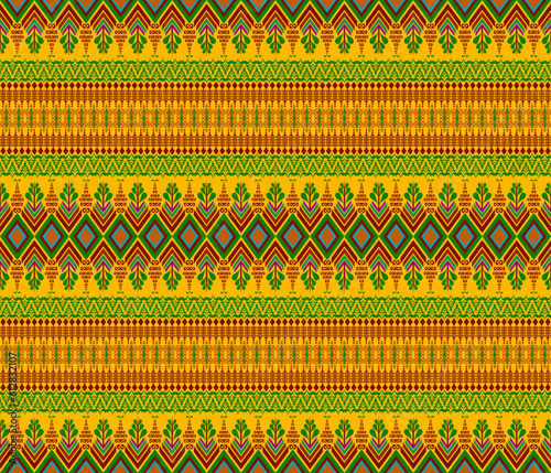 Embroidery indian aztec fabric pattern green, dark brown on yellow vector illustration design for fabric, mat, carpet, scarf, wrapping paper, tile and more