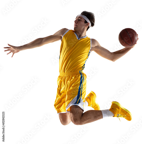 Sportive young man, professional basketball player training with basketball ball isolated over transparent background. © Lustre