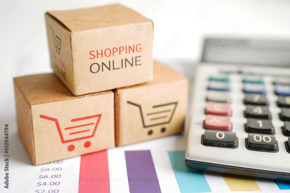 Online shopping, Shopping cart box on business graph, import export, finance commerce.