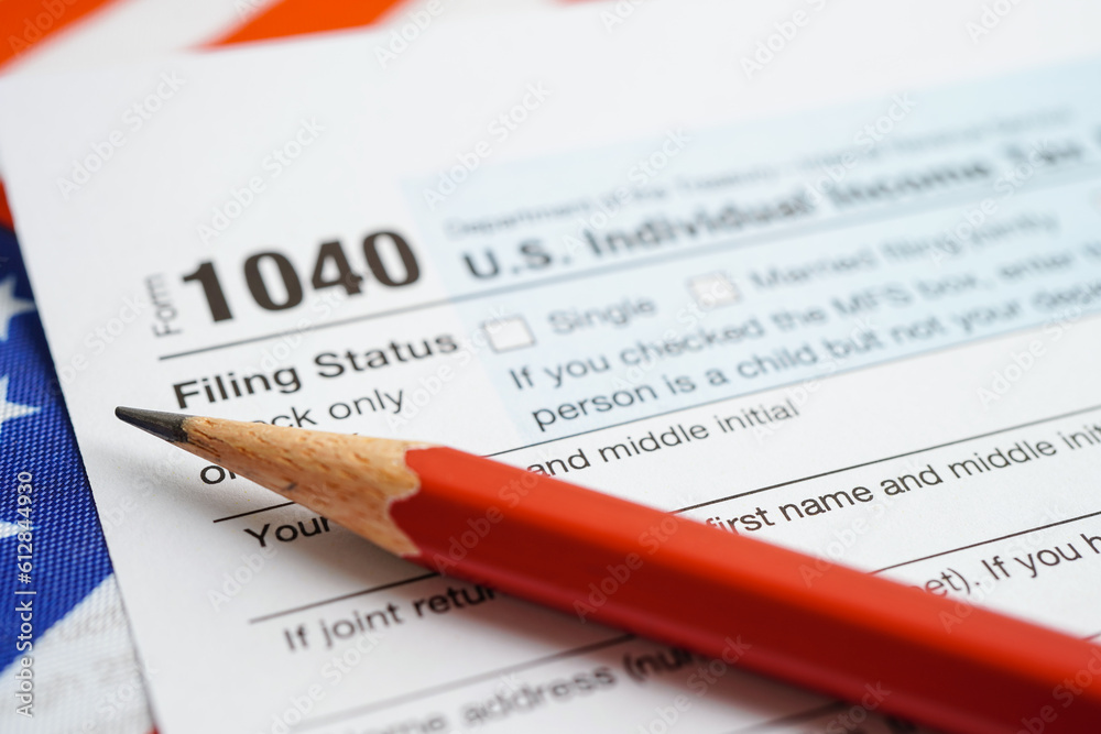 Tax form 1040 U.S. Individual Income Tax Return, business finance concept. Tax form 1040 U.S. Individual Income Tax Return, business finance concept.