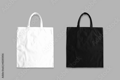 Blank Black and white Canvas tote bag mockup template isolated. linen cotton tote shopping bag on a grey background. 3d rendering. zero waste and eco friendly concept.