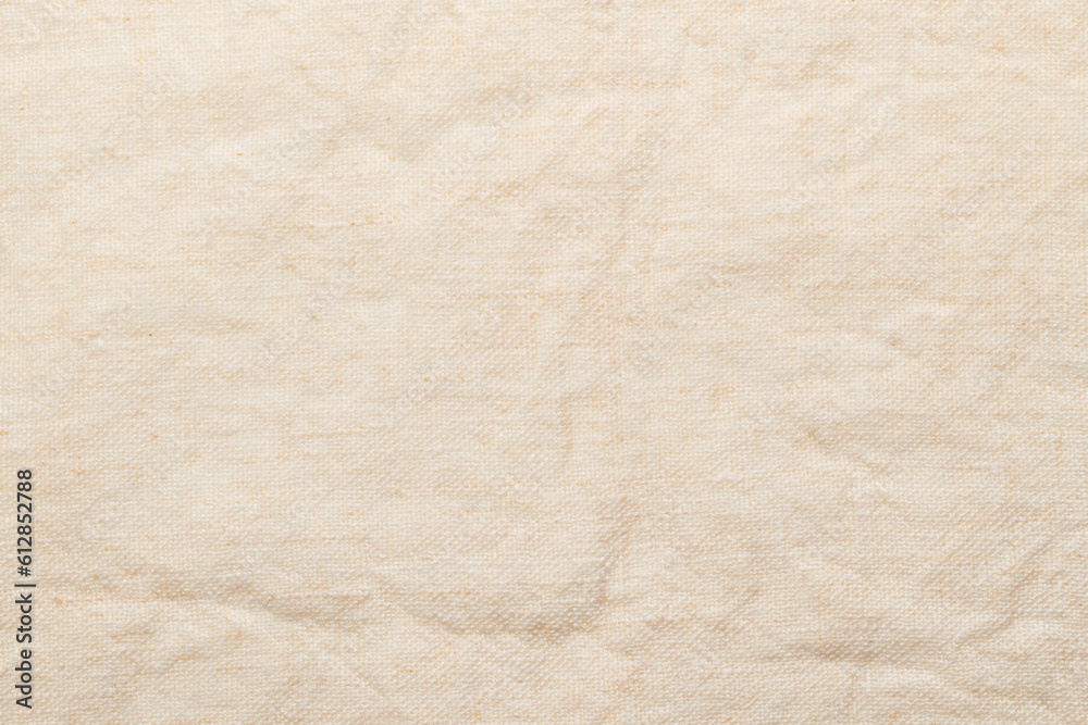 Linen crumpled texture natural fabric background closeup Linen crumpled texture natural fabric background closeup