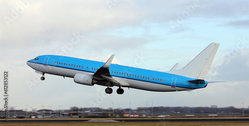 Blue plane taking off 