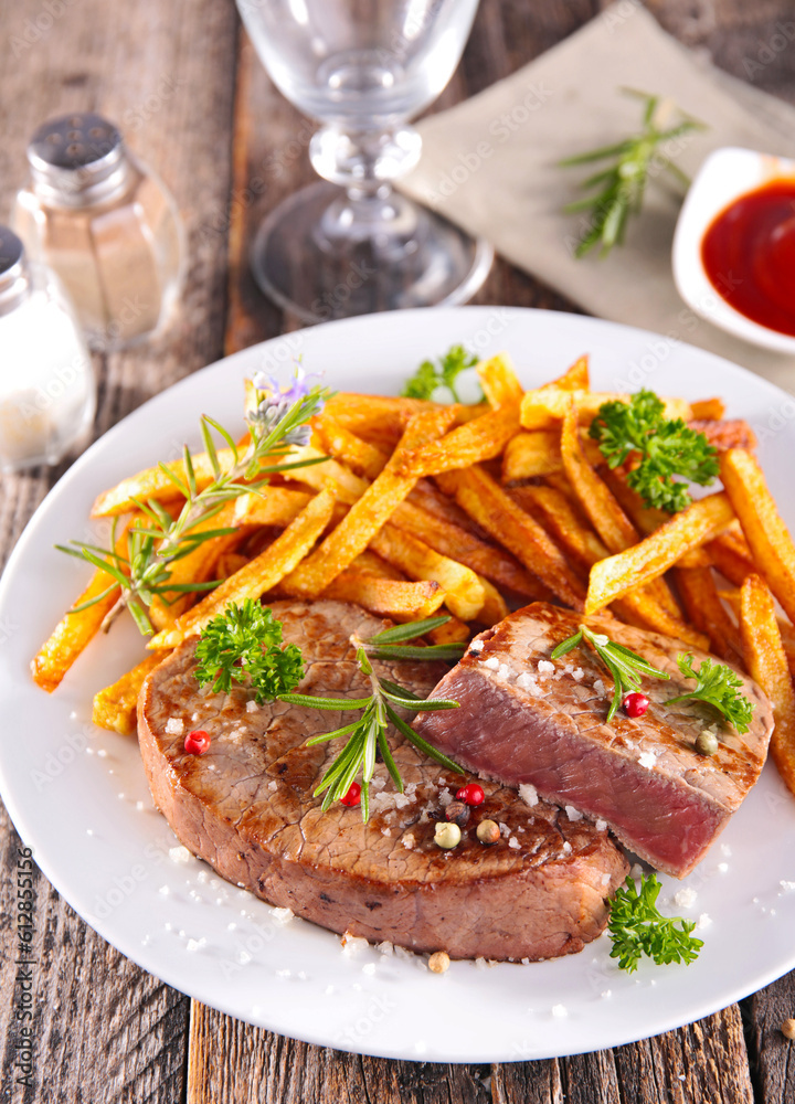 grilled beef steak with french fries