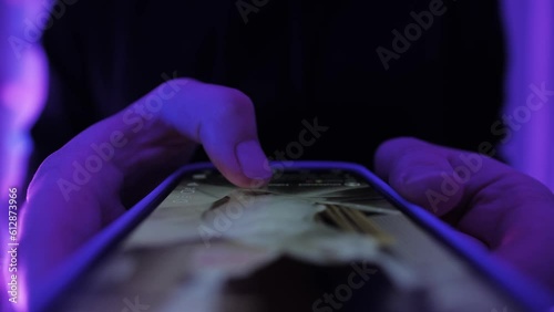 Woman chatting online on smartphone macro close up, typing text message, touching touchscreen keyboard, using messenger application. Female holding mobile phone, close up, swiping social media. 