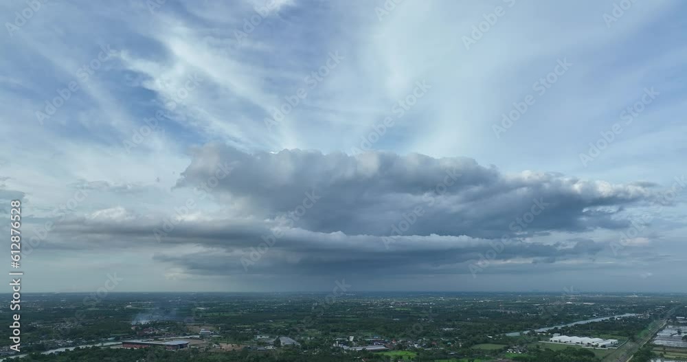 flying above small town country side with super cloud with storm in sunset flying above small town country side with super cloud with storm in sunset