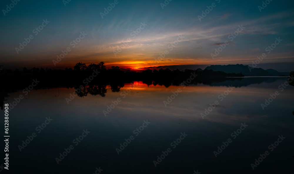 Sunset sunrise twilight sky over beautiful lake nature background