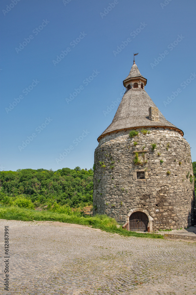 Old stone medieval Potter Tower in Kamianets-Podilskyi fortress, Ukraine.