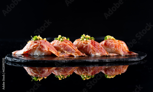 Sushi of Japanese, Salmon Roll Sushi. Collection of sushi on dark background, sushi is a Japanese favorite, Japanese food
