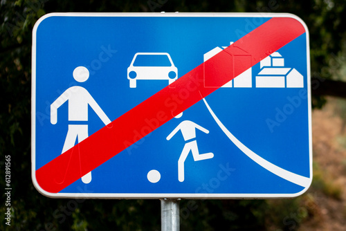 Traffic signs, various: direction indicators, prohibited turning, works, caution children... In a Portuguese city