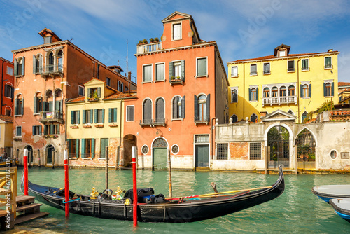 Gondola in a canal of the old town of Venice, Italy, Europe.