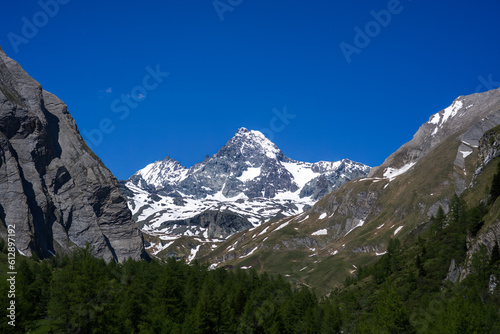 beautiful view of the gross glockner, the highest mountainof austria, in the hohe tauern national park at a sunny summer day