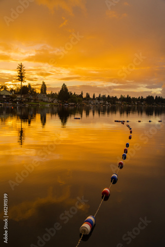 Golden sunset and reflections on Lake Meridian in Kent, WA
