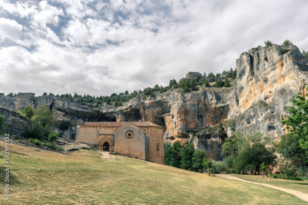 landscape of a hermitage church in a canyon between mountains of soria in spain