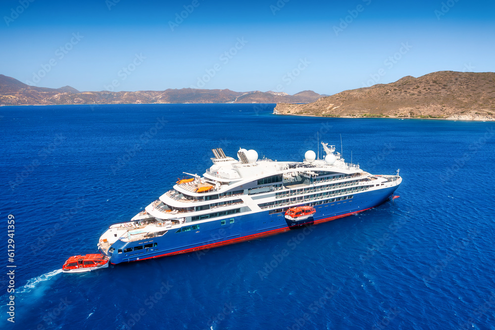 An aerial view of the cruise liner. A huge cruise ship. Vacations and vacations. Summer time for sea travel. The sea bay. Photo for background and wallpaper. Mediterranean Sea.