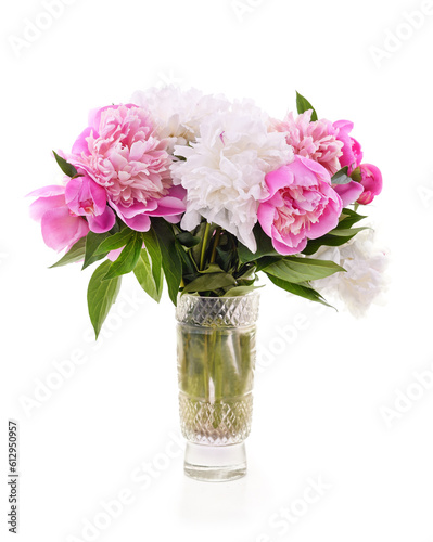 White and pink peonies in a vase.