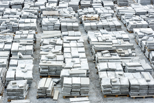 stacks of old tiles have been removed from the sidewalk, repair of the pedestrian road