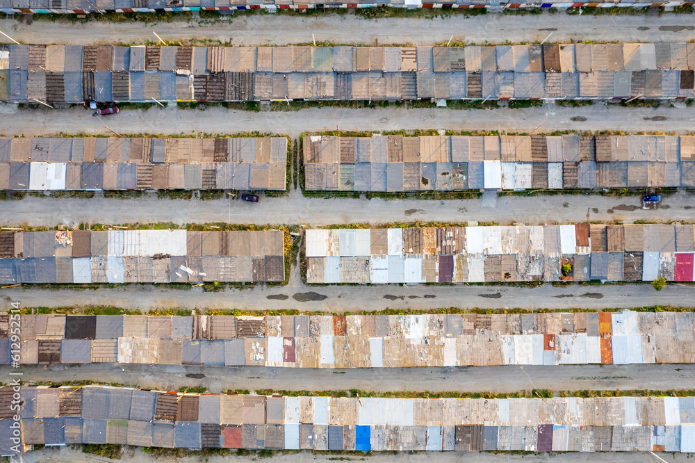 aerial view of the horizontal rows of numerous garage roofs
