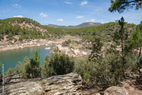 Las Tosquillas reservoir with turquoise water, surrounded by scenic mountains in dry season Teruel Aragon Spain