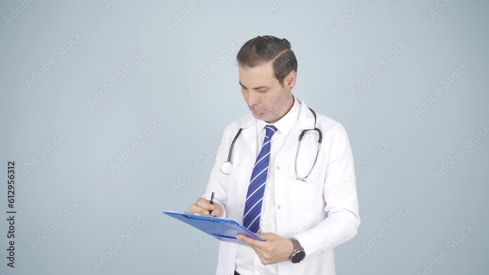 The doctor examining the paperwork is thoughtful. The doctor examining the paperwork is thoughtful.