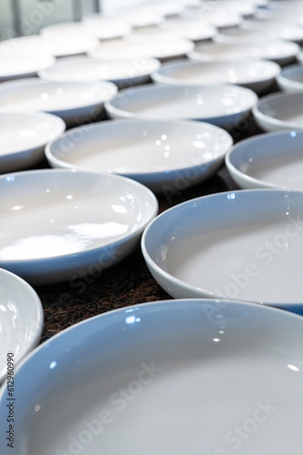 Empty plates in a restaurant kitchen.