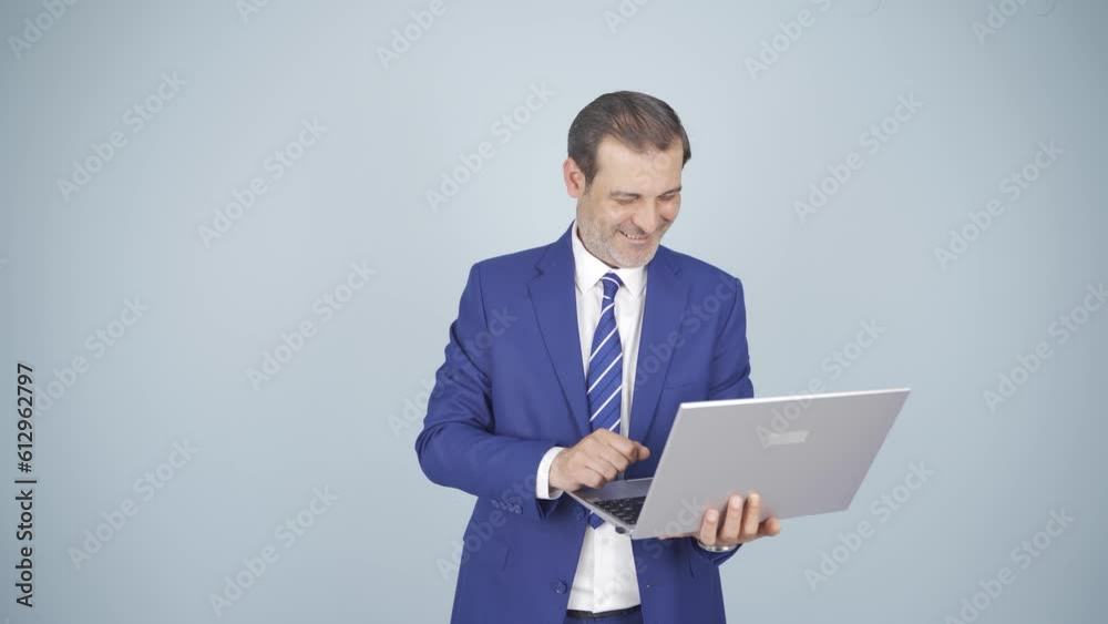 Businessman relaxes after finishing his work on laptop. Businessman relaxes after finishing his work on laptop.
