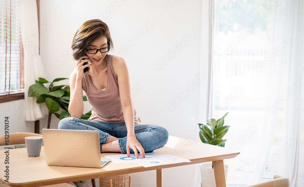 Portrait of smiling beautiful business asian woman working in office using computer with copy space. Business people freelance online marketing e-commerce telemarketing sme, work from home concept Portrait of smiling beautiful business asian woman working in office using computer with copy space. Business people freelance online marketing e-commerce telemarketing sme, work from home concept