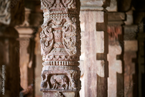 Canvas Print Stone columns with decorative bas relief of Qutb complex in South Delhi, India,