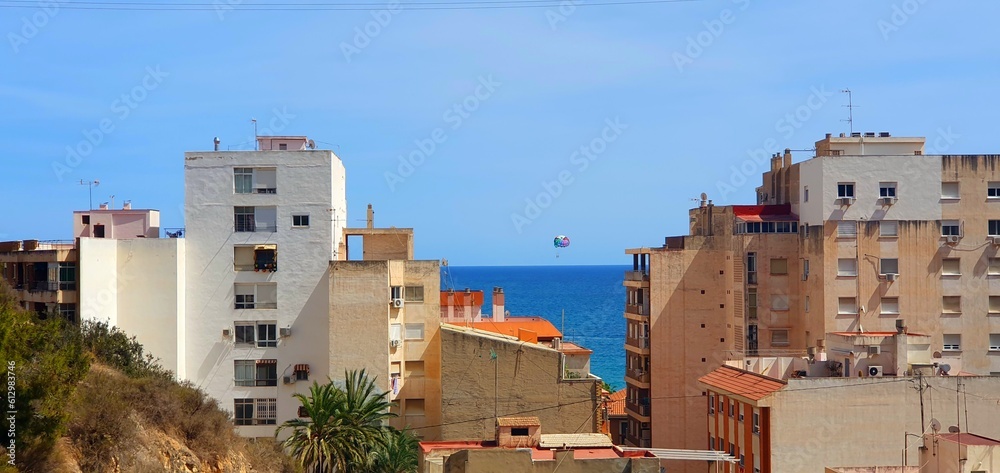 Panorama of the city of Alicante in Spain overlooking the sea. View of the mediterranean sea from the mountain. Spanish city of Alicante. Tourism in Spain. Vacation in Spain. Mountains in Spain.