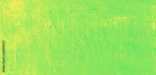 Yellow speckled hand-painted illustration texture design of old distressed vintage grunge concrete with green stains. damaged textured abstract washed cement backdrop as web banner background.