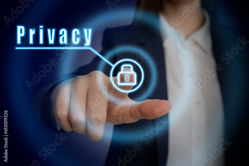 Privacy policy. Woman touching button with padlock on virtual screen against dark blue background, closeup