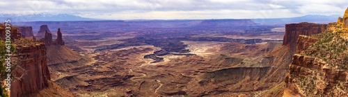 Panorama of canyon below Mesa Arch in the Island in the Sky district of Canyonlands National Park near Moab Utah. 