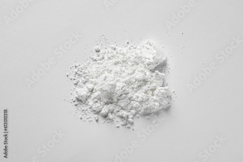 Fotografía Heap of calcium carbonate powder on white background, top view