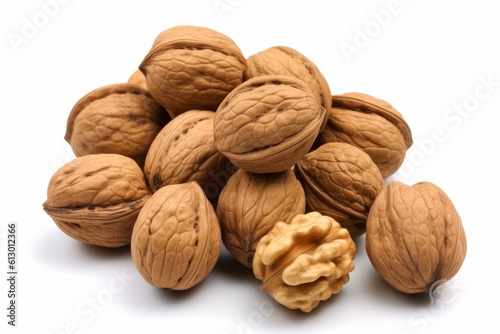 A bunch of loose and stacked walnuts with some cracked open on a white background with shadows. are photographed closely. Generated Ai.