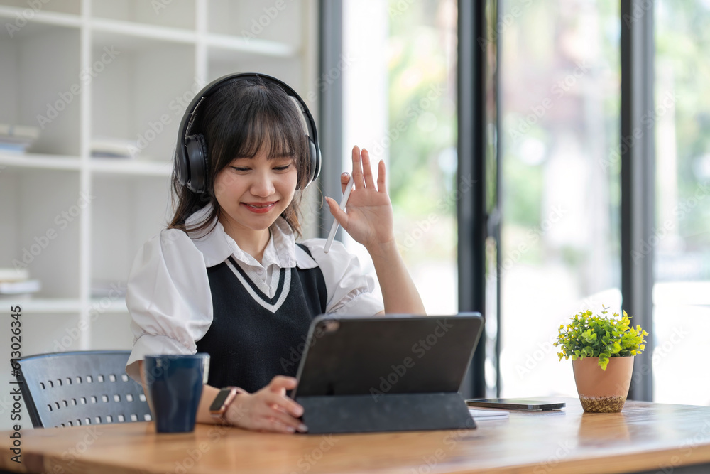 Asian girl student online learning class study online video call zoom teacher, Happy asian girl learn english language online with computer laptop.. Asian girl student online learning class study online video call zoom teacher, Happy asian girl learn english language online with computer laptop..