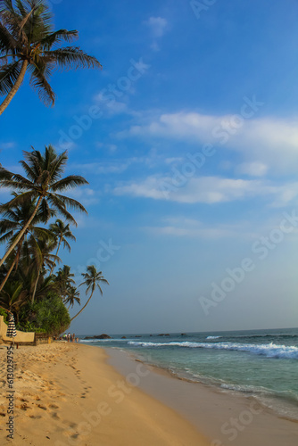 Tropical beach paradise with palm trees, Dalawella, Unawatuna, Sri Lanka